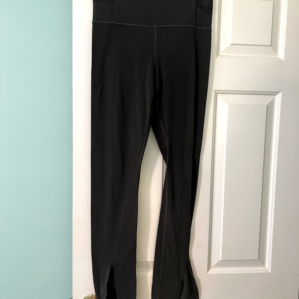 Athleta Aura split pants in greenish gray color, size M